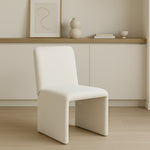 تحميل الصورة إلى عارض المعرض، The Carl two leg chair adding a touch of modern elegance to a chic living room setup.