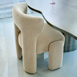 تحميل الصورة إلى عارض المعرض، The Baloud foam dining chair, combining plush cushioning with modern aesthetics in a bright dining area.
