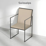 تحميل الصورة إلى عارض المعرض، The Joelle dining chair with iron legs, bringing modern elegance to a beautifully set dining area.