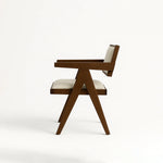 تحميل الصورة إلى عارض المعرض، The Pierre dining chair with a solid wood frame, adding a rustic yet refined touch to any dining area.