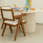تحميل الصورة إلى عارض المعرض، Modern wood frame dining chair, positioned around a minimalist dining table to create a warm atmosphere.