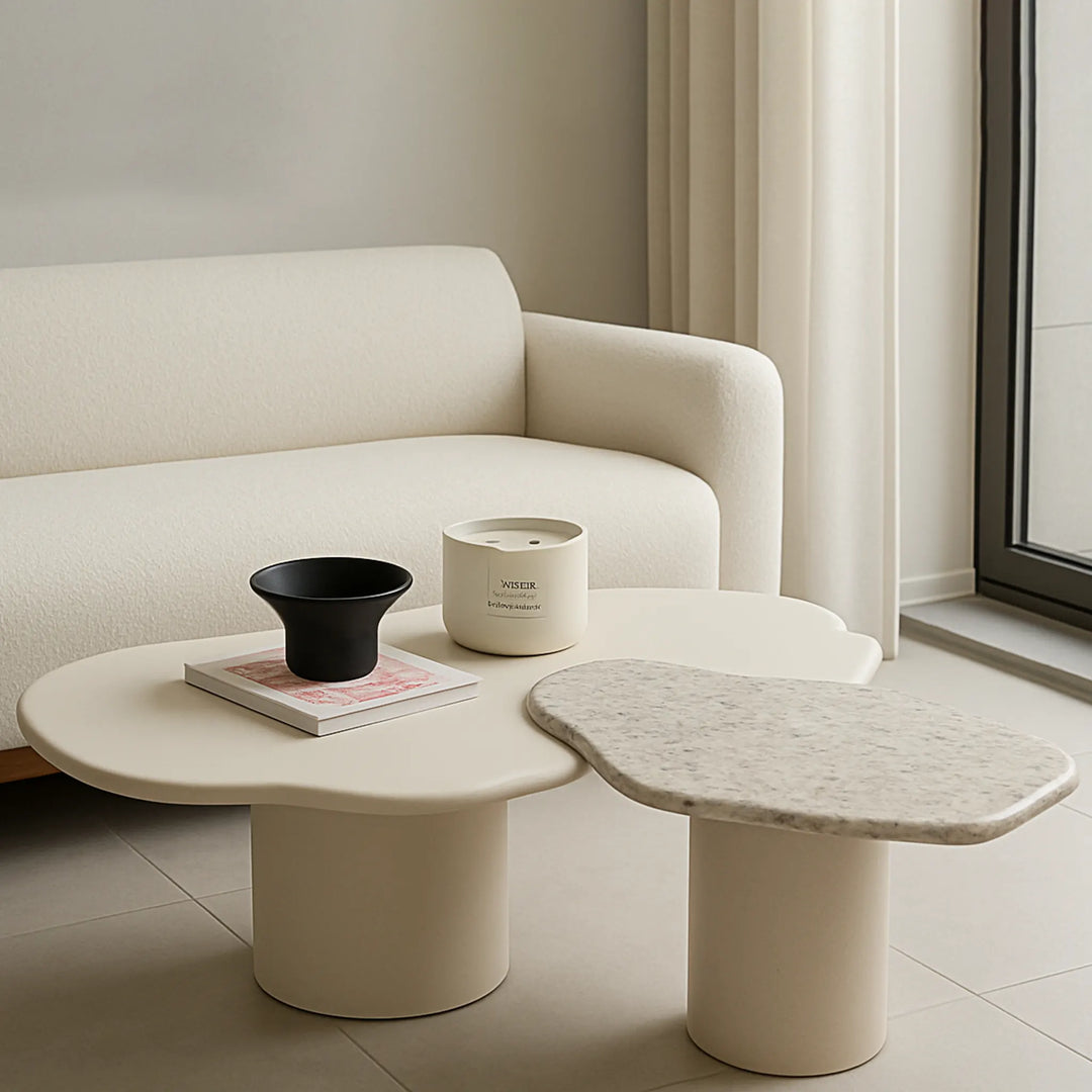 Close-up of The Elon Nesting Coffee Tables reveals the intricate white marble veining and smooth finish, highlighting their quality craftsmanship.