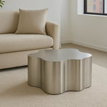 تحميل الصورة إلى عارض المعرض، The Genevive Stainless Steel Coffee Table (Medium) complements a contemporary couch, creating a polished living room look.