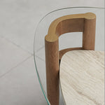 تحميل الصورة إلى عارض المعرض، Detail view of the tempered glass surface on The Scott Coffee Table, highlighting the fine craftsmanship of its wooden base – a clear glass coffee table with refined elegance.