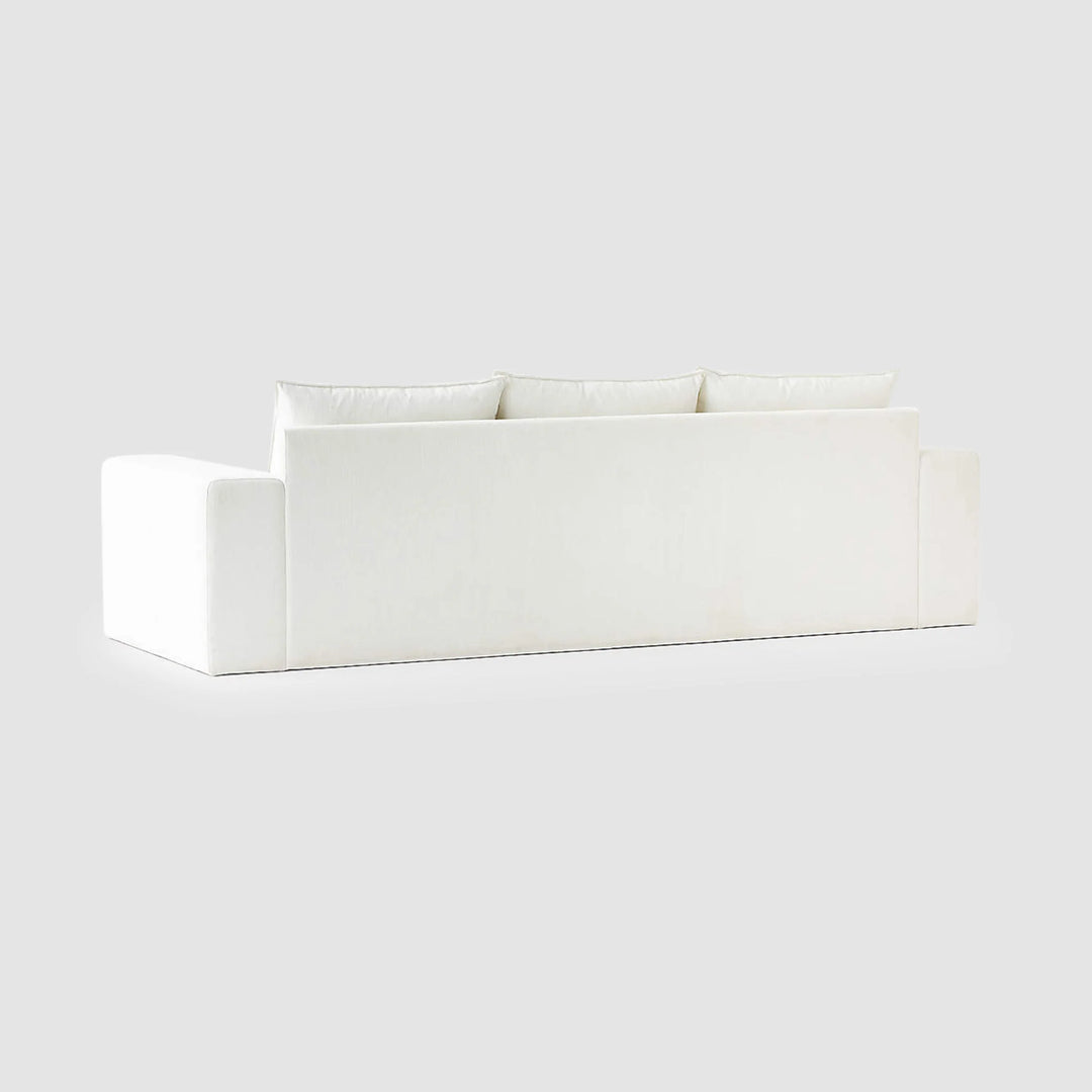 Contemporary modern white sofa crafted with smooth, seamless upholstery for modern living.