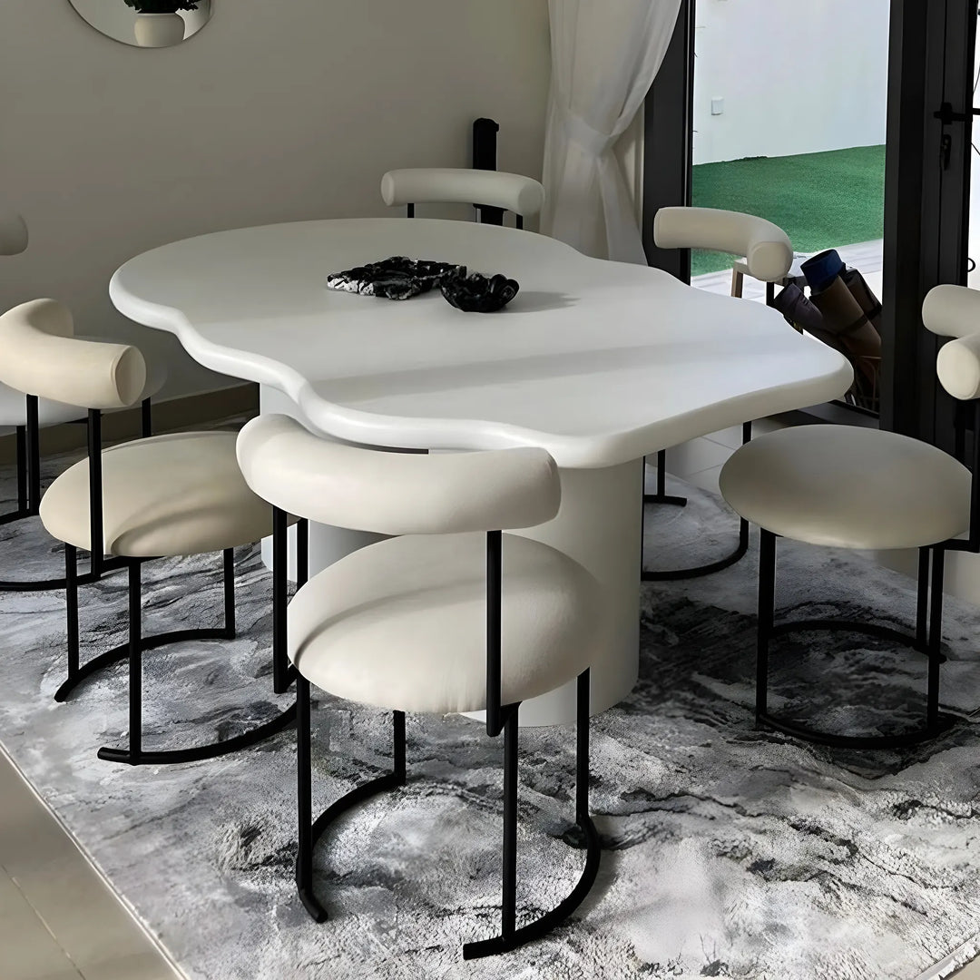 A modern round dining chair, adding a touch of sophistication to your dining room setup.