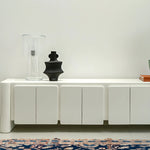 تحميل الصورة إلى عارض المعرض، White TV stand with a seamless finish, offering both utility and a modern look in family homes.