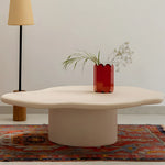 تحميل الصورة إلى عارض المعرض، The Jamie Coffee Table grounds this loft-style room with its smooth curves and sturdy form – an affordable round coffee table UAE city dwellers will appreciate.