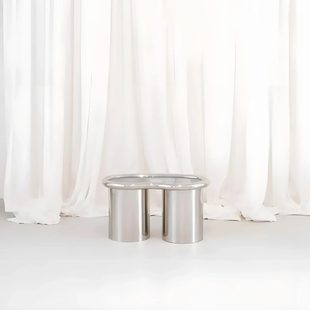 The Willow Chrome Coffee Table With Small Gestures complements contemporary interiors, offering both elegance and practicality.