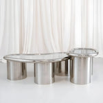 تحميل الصورة إلى عارض المعرض، Detailed view of The Willow Chrome Coffee Table With Small Gestures highlights the seamless connection between glass and chrome.