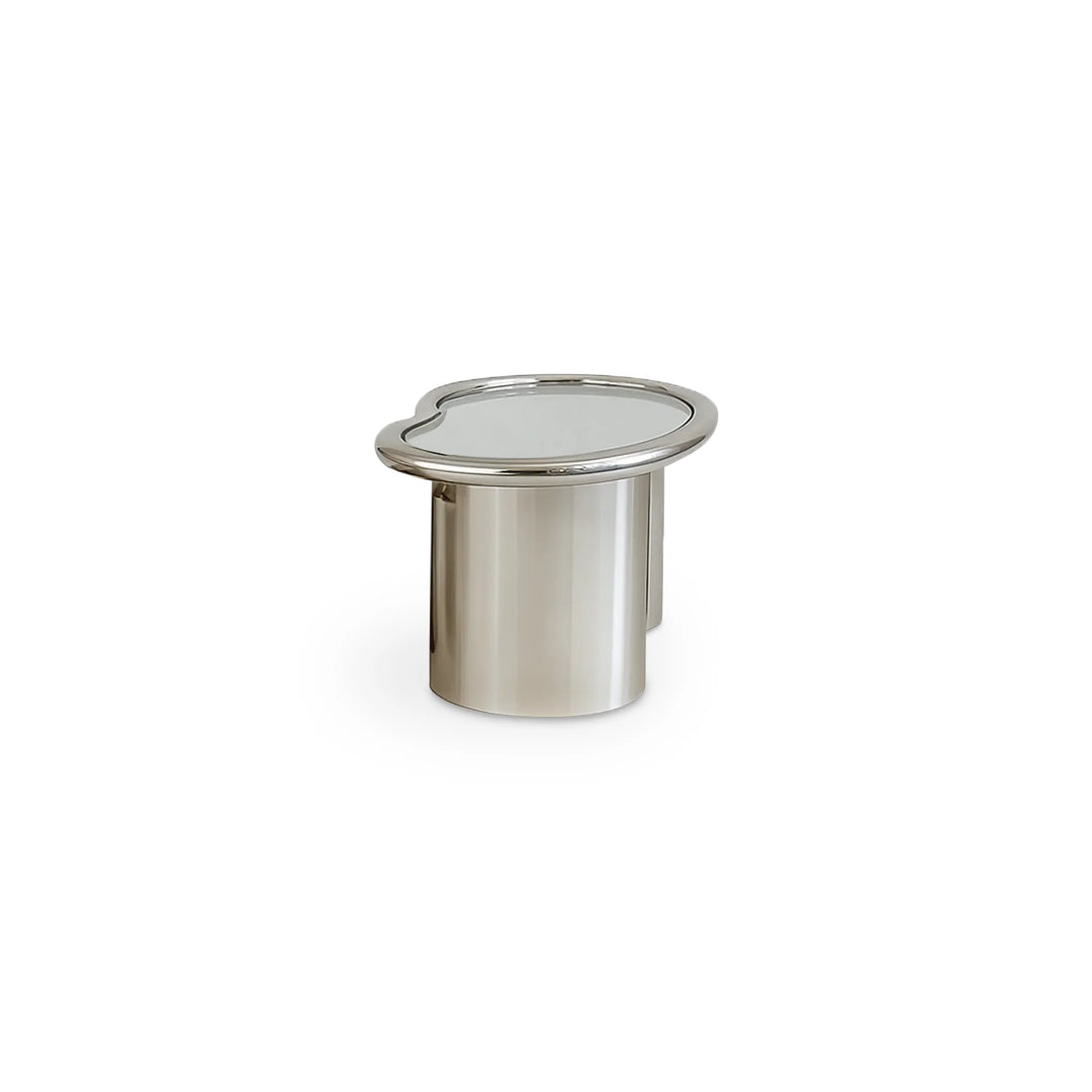The Willow Chrome Coffee Table With Small Gestures—compact glass-top table with stainless steel legs, ideal for modern minimalist interiors.