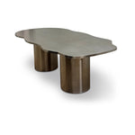 تحميل الصورة إلى عارض المعرض، The Victoria stainless steel dining table, offering a unique curvy design for a contemporary dining space.
