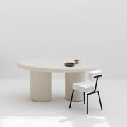 Polar fabric chair paired with a polished dining table, creating a cozy yet stylish dining environment.