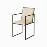 تحميل الصورة إلى عارض المعرض، Elegant iron leg dining chair featuring a minimalist design and sturdy construction.