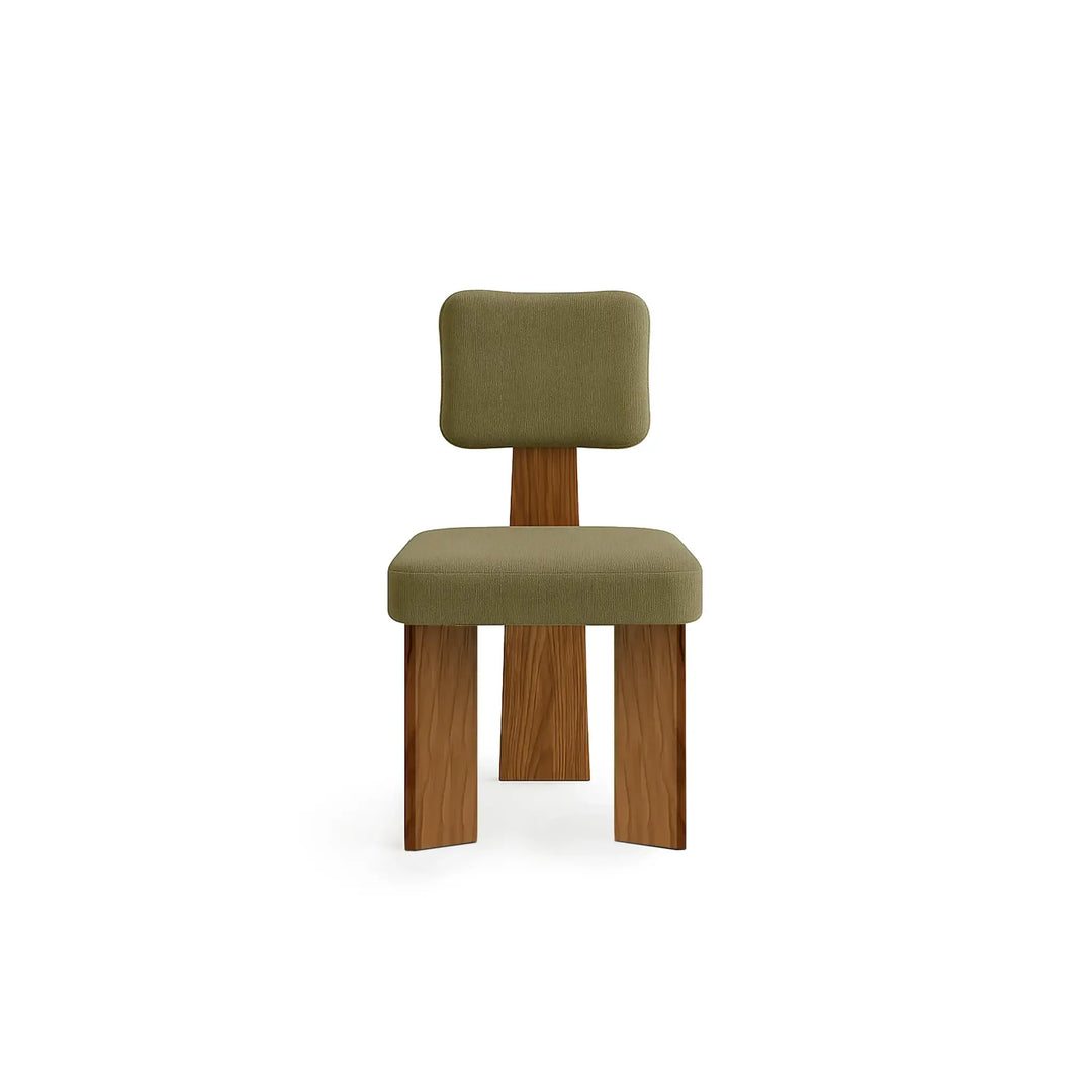 The Lena dining chair with wooden legs, showcasing a sleek and minimalist design.