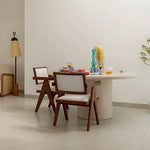 تحميل الصورة إلى عارض المعرض، The Marx round dining table, blending seamlessly into a modern dining room with its timeless design.