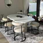تحميل الصورة إلى عارض المعرض، The Victoria 6 seater dining table styled in a contemporary dining room, offering a luxurious and curvy design.