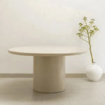 تحميل الصورة إلى عارض المعرض، The Marx dining table in a round shape, creating a focal point in a beautifully styled dining space.