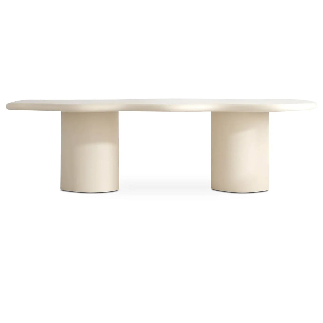 The Victoria Curvy 6 seater dining table in microplaster, perfect for modern and spacious dining rooms.