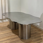 تحميل الصورة إلى عارض المعرض، Sleek and modern steel dining table in stainless steel, paired with elegant chairs for a luxurious dining room.