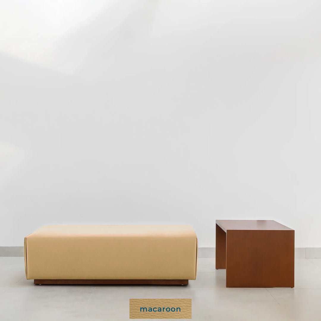 Modern living room with Italian ottoman and Sebastian Coffee Table in wooden finish.
